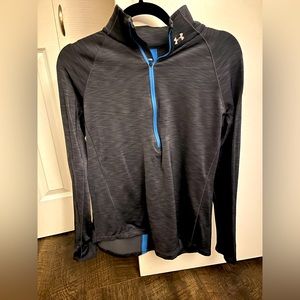 Under Armour 3/4 zip running/workout top. In excellent condition